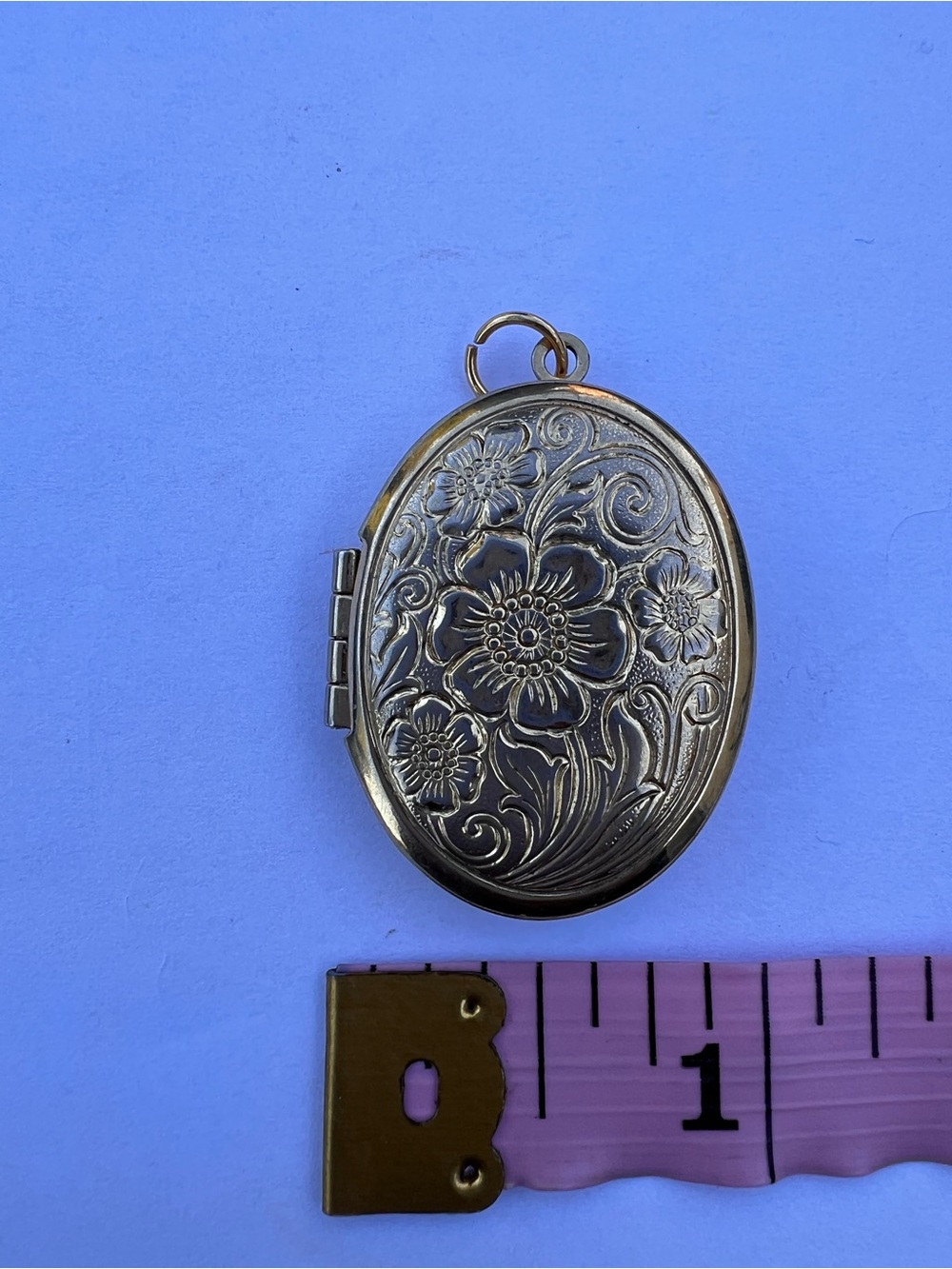 Floral Engraved Oval Locket Necklace in Antique Gold Tone